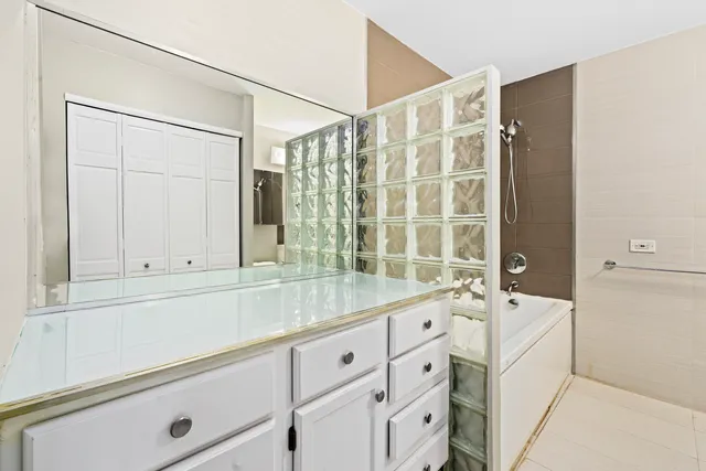 a bathroom with a sink and a bathtub