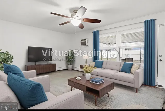 a view of livingroom with furniture and wooden floor