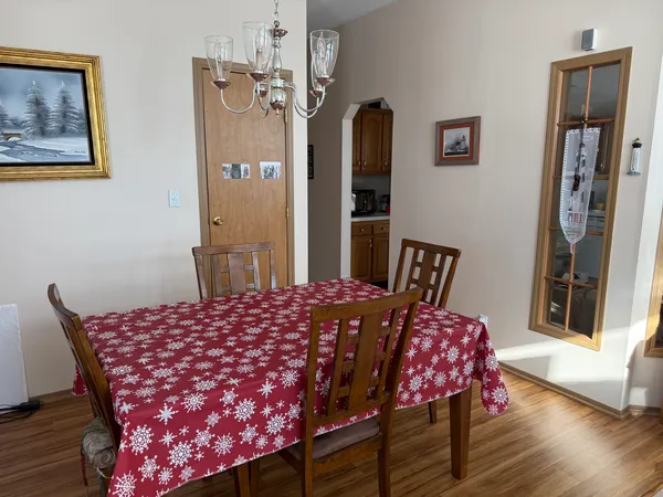 a view of a dining room with furniture
