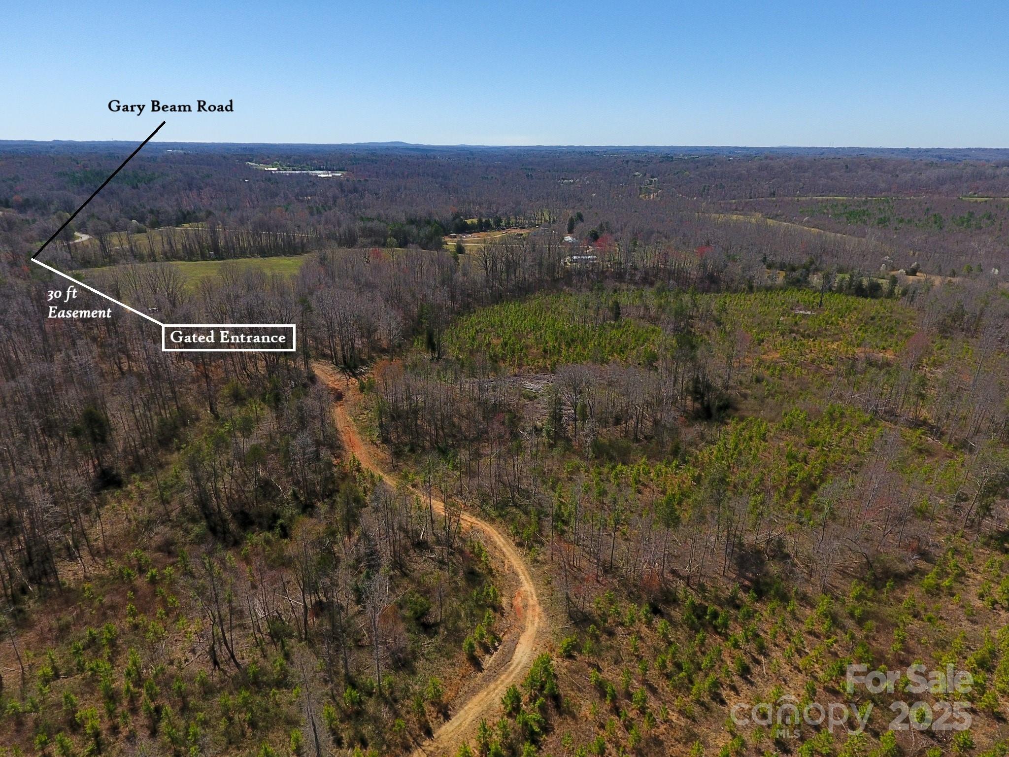 0 Gary Beam Road Kings Mountain, NC 28086 - Photo 1 of 15 a view of a city with lush green forest