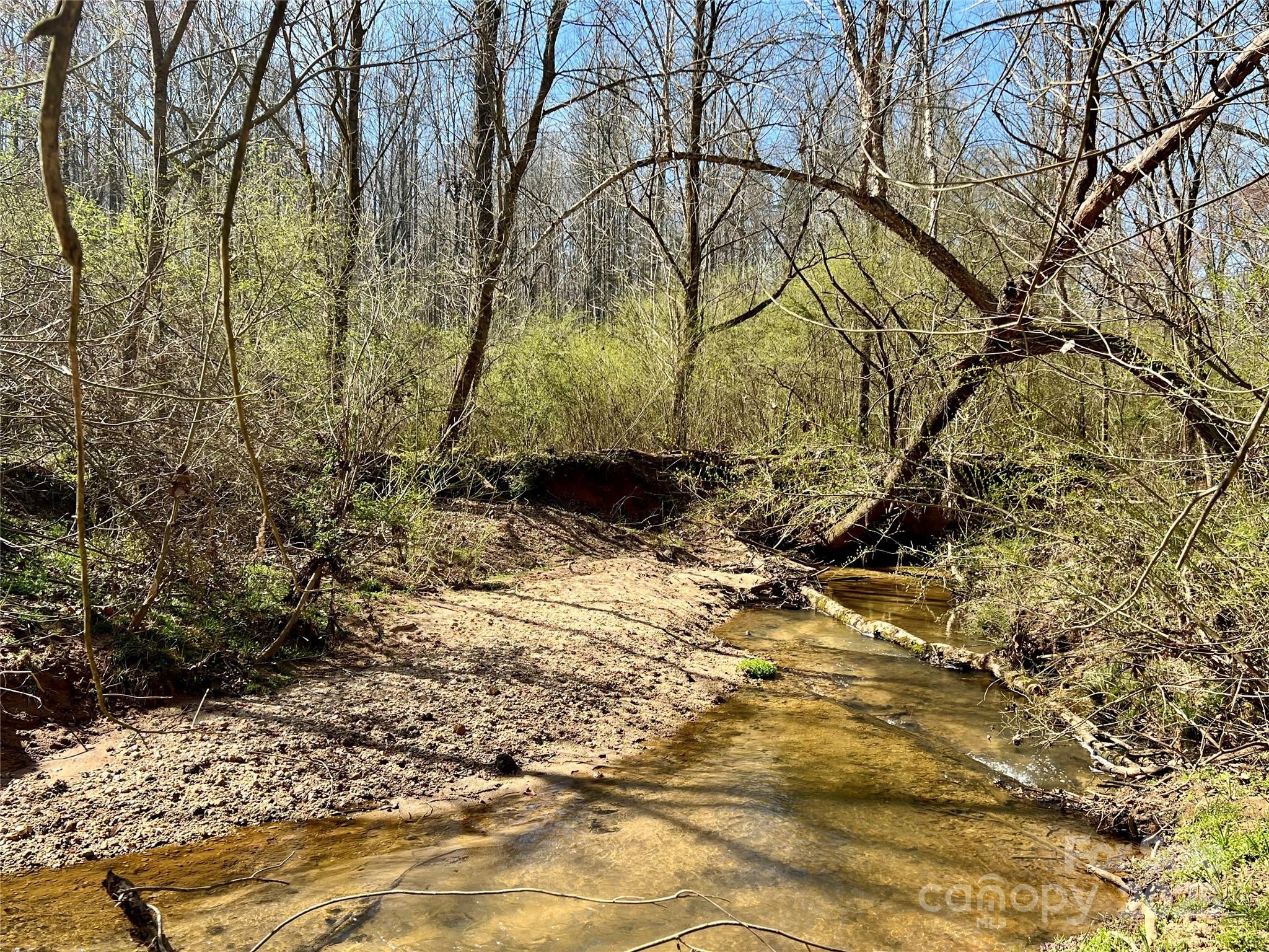 0 Gary Beam Road Kings Mountain, NC 28086 - Photo 7 of 15 a backyard of a house with a yard and large tree