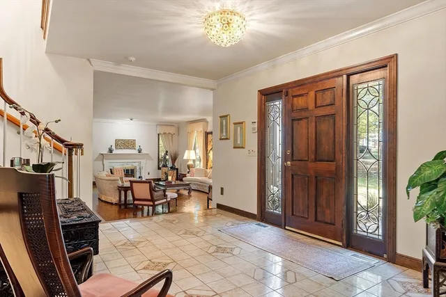 a view of a livingroom with furniture and workspace