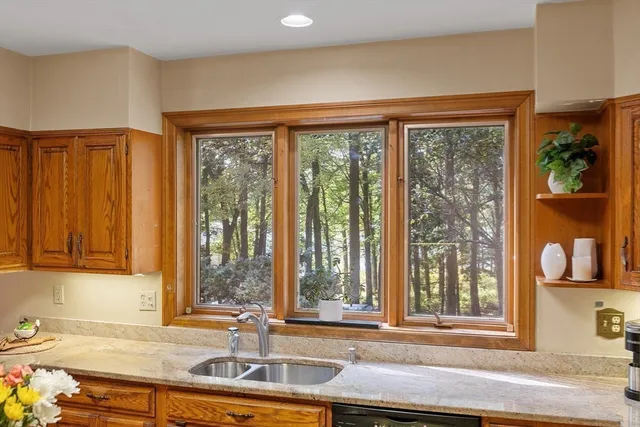 a view of a sink and a window
