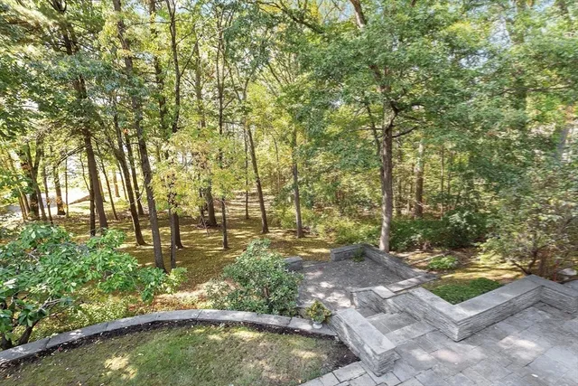 a view of swimming pool with a yard
