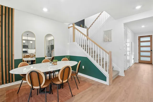 a stove top oven sitting inside of a kitchen