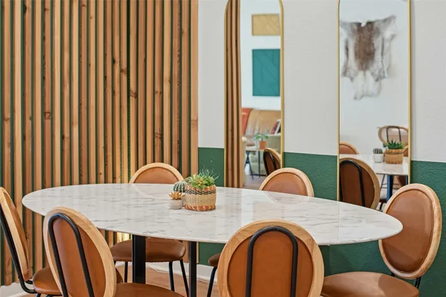 a view of a dining room with furniture