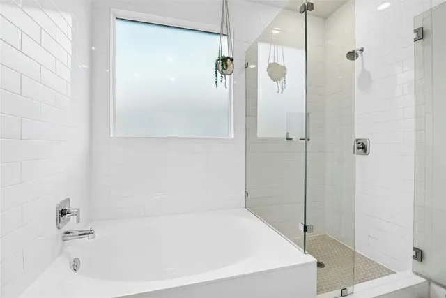 a en suite bathroom with a sink and a mirror