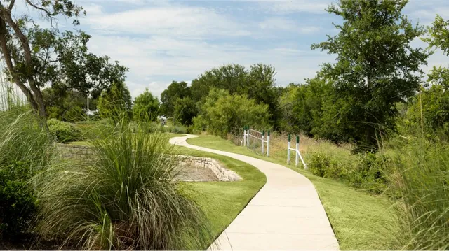 a view of swimming pool with a yard