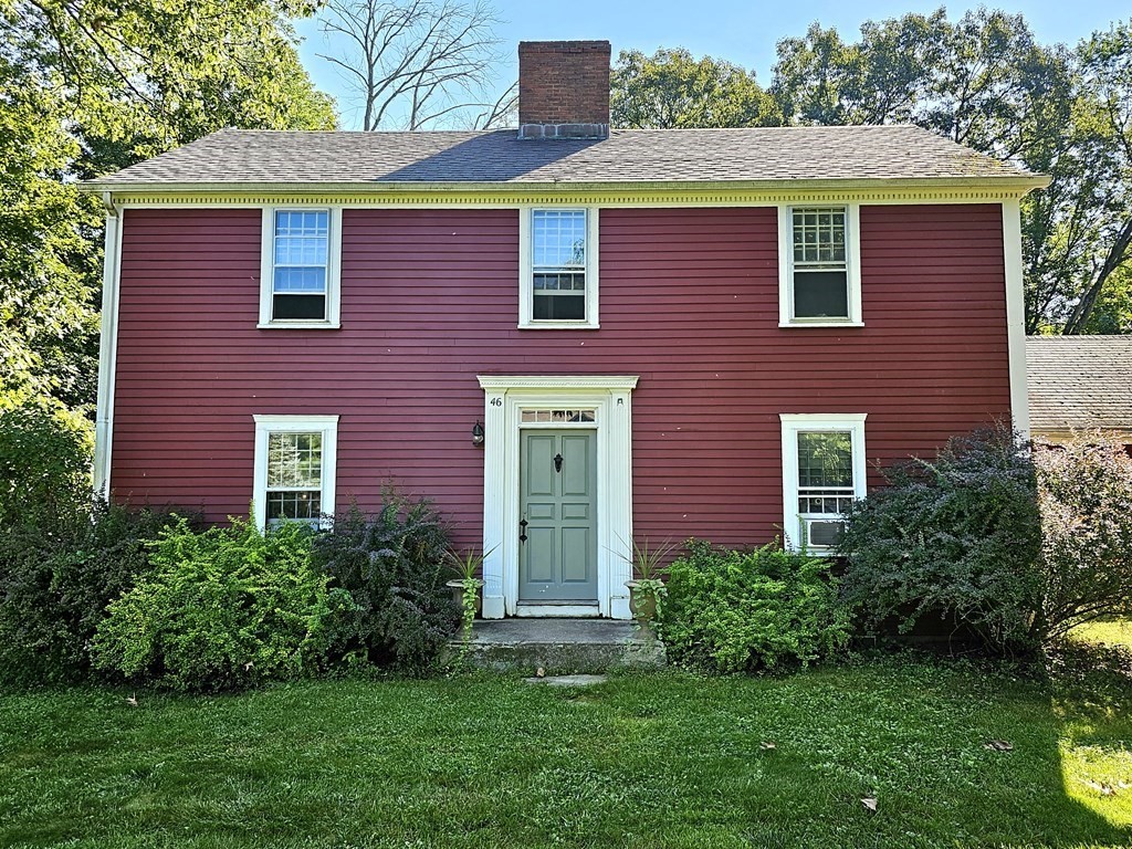 46 Willard Road Sturbridge, MA 01566 - Photo 4 of 37 a view of a brick house with a yard