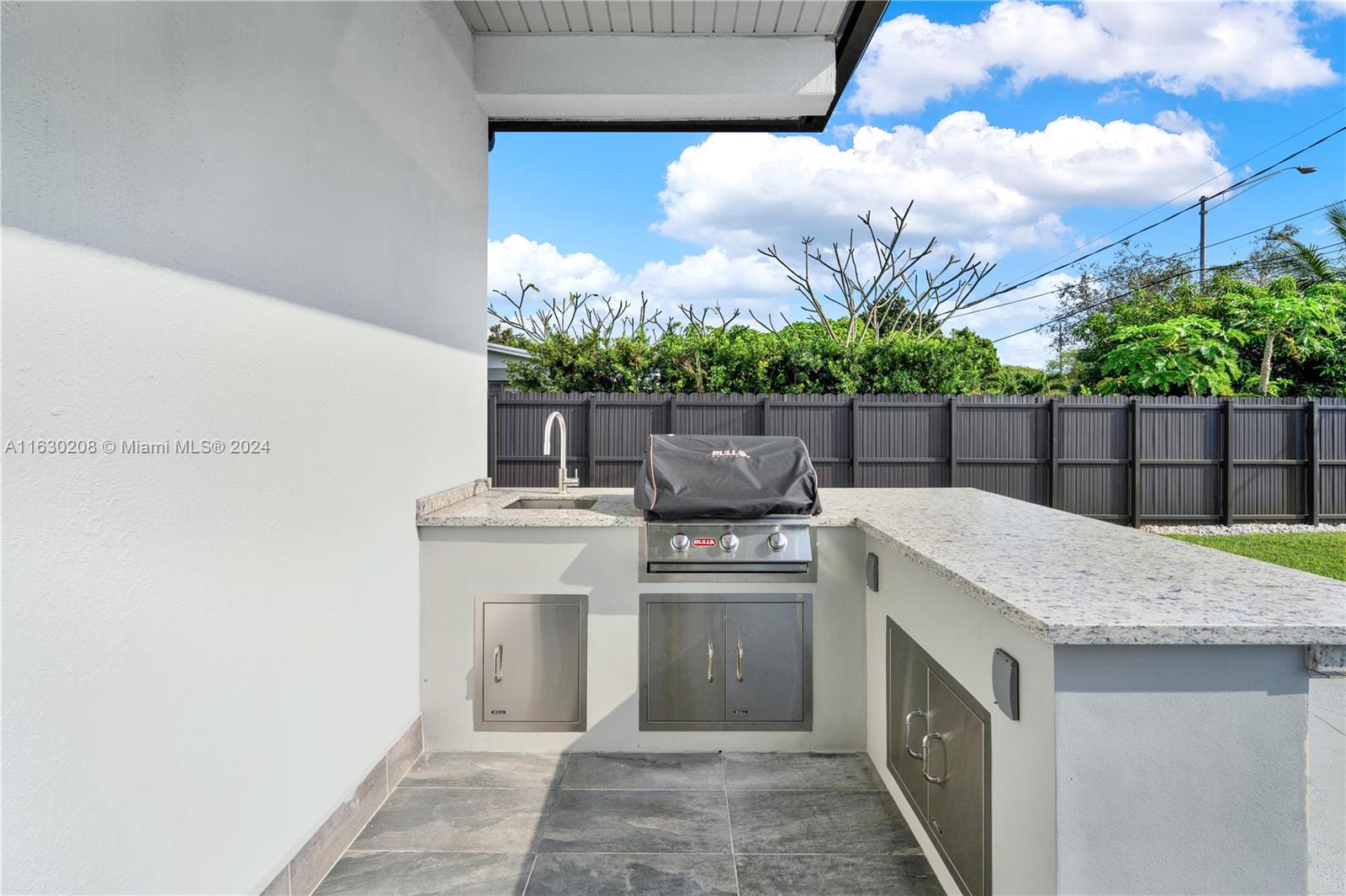11921 Southwest 82nd Road Miami, FL 33156 - Photo 28 of 32 a view of storage and utility room