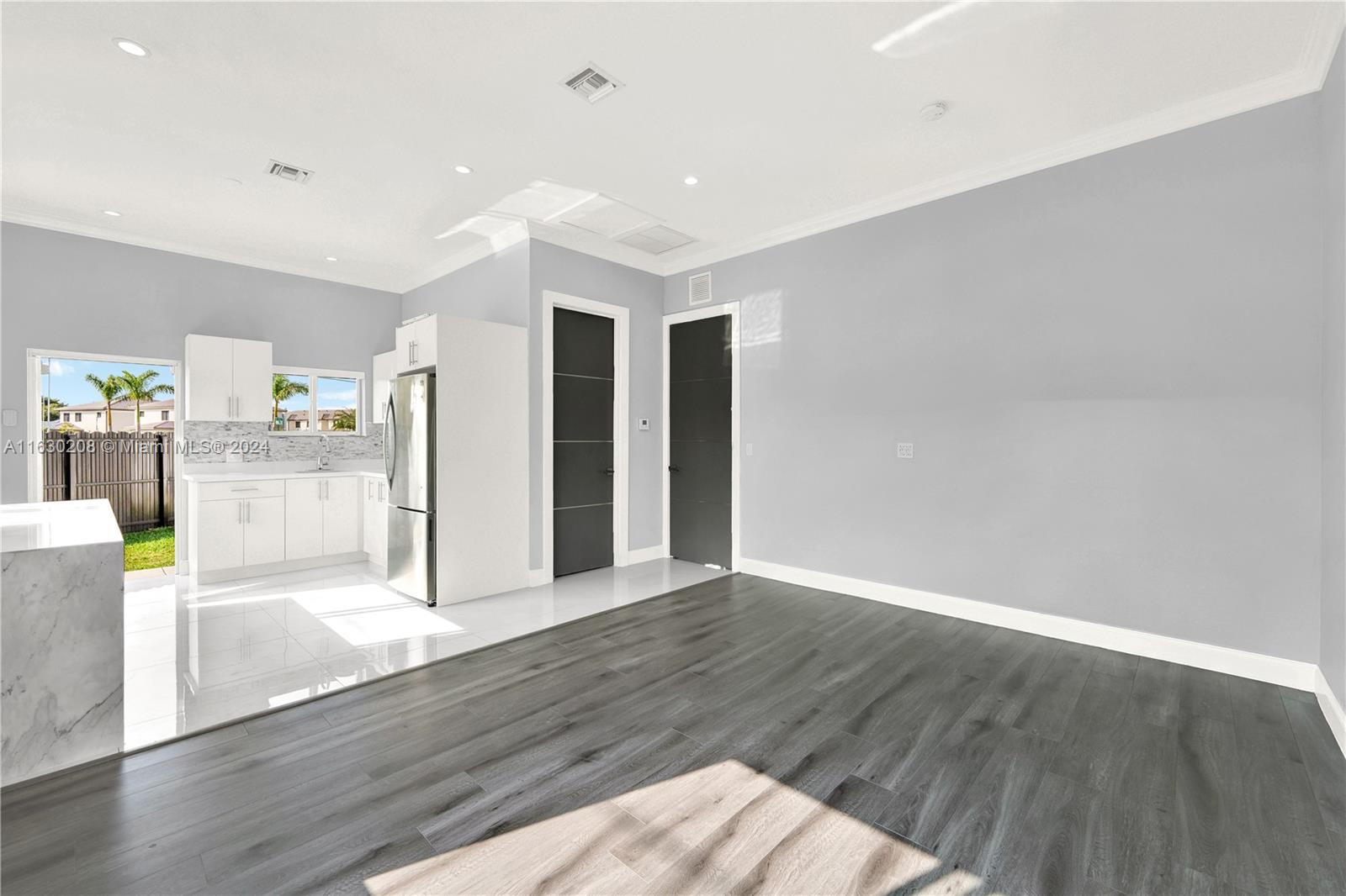 11921 Southwest 82nd Road Miami, FL 33156 - Photo 31 of 32 a view of a kitchen with wooden floor