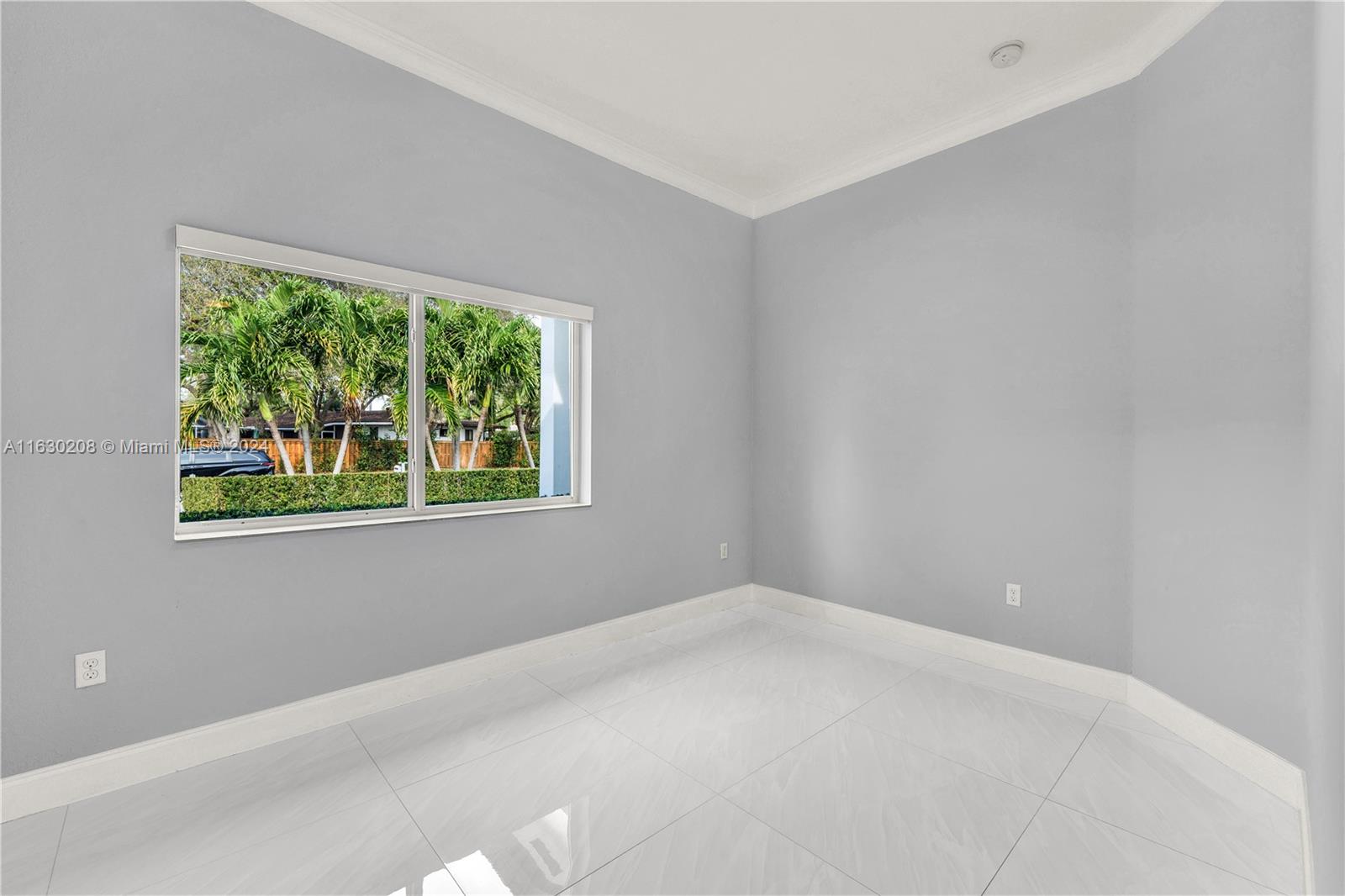 11921 Southwest 82nd Road Miami, FL 33156 - Photo 6 of 32 a view of a window in a room