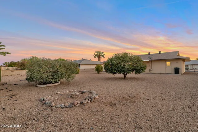 a view of a road with a building in the background