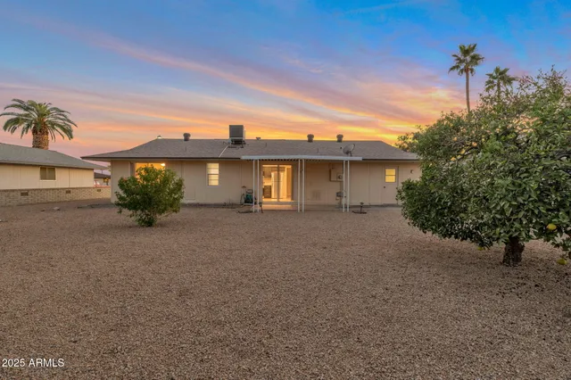 a view of a house with a street