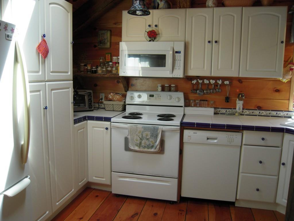 290 Stone Road West Newfield, ME 04095 - Photo 8 of 30 Plenty of cabinet with nice pantry