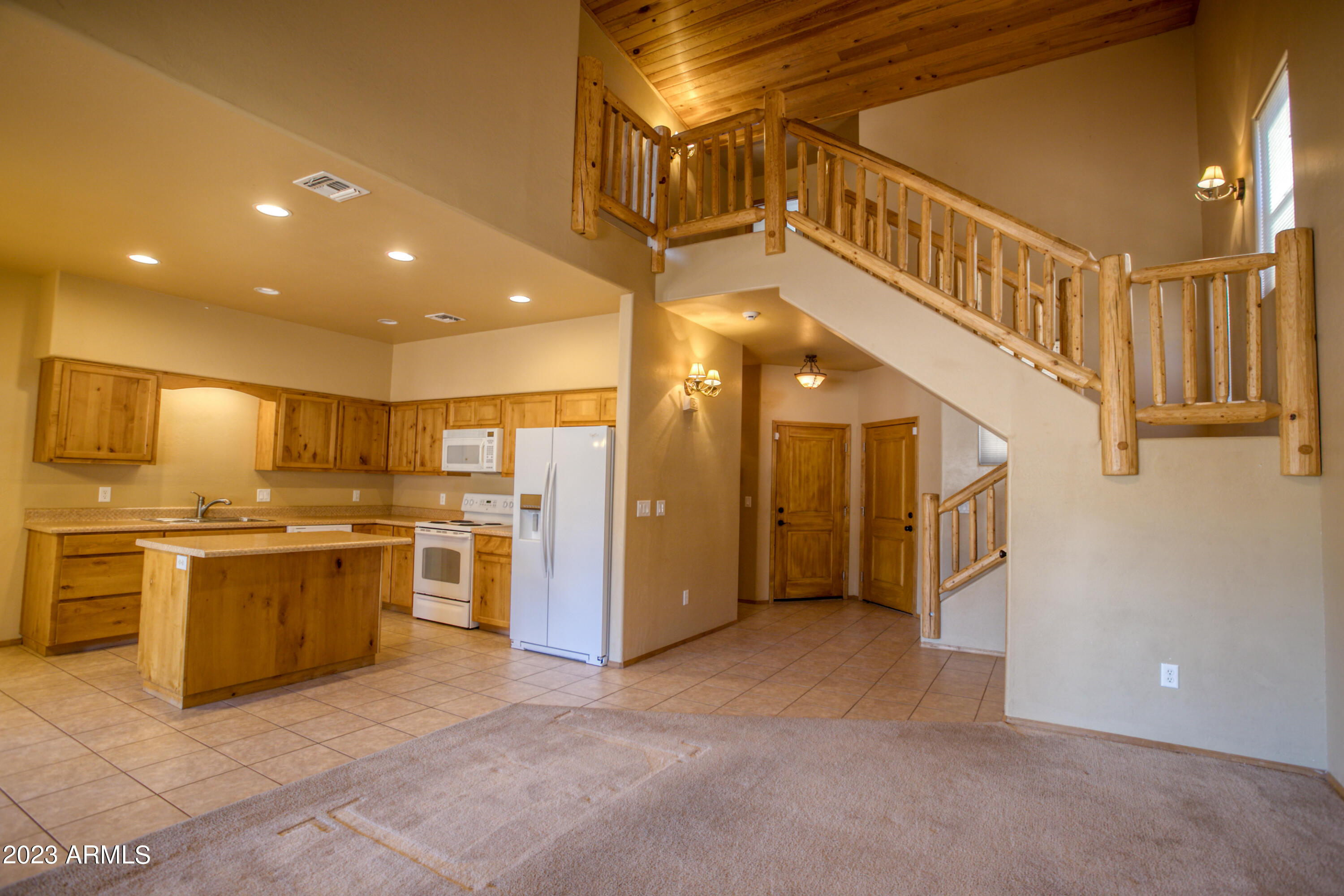 6141 West Starlight Ridge Parkway Lakeside, AZ 85929 - Photo 2 of 23 Living to kitchen