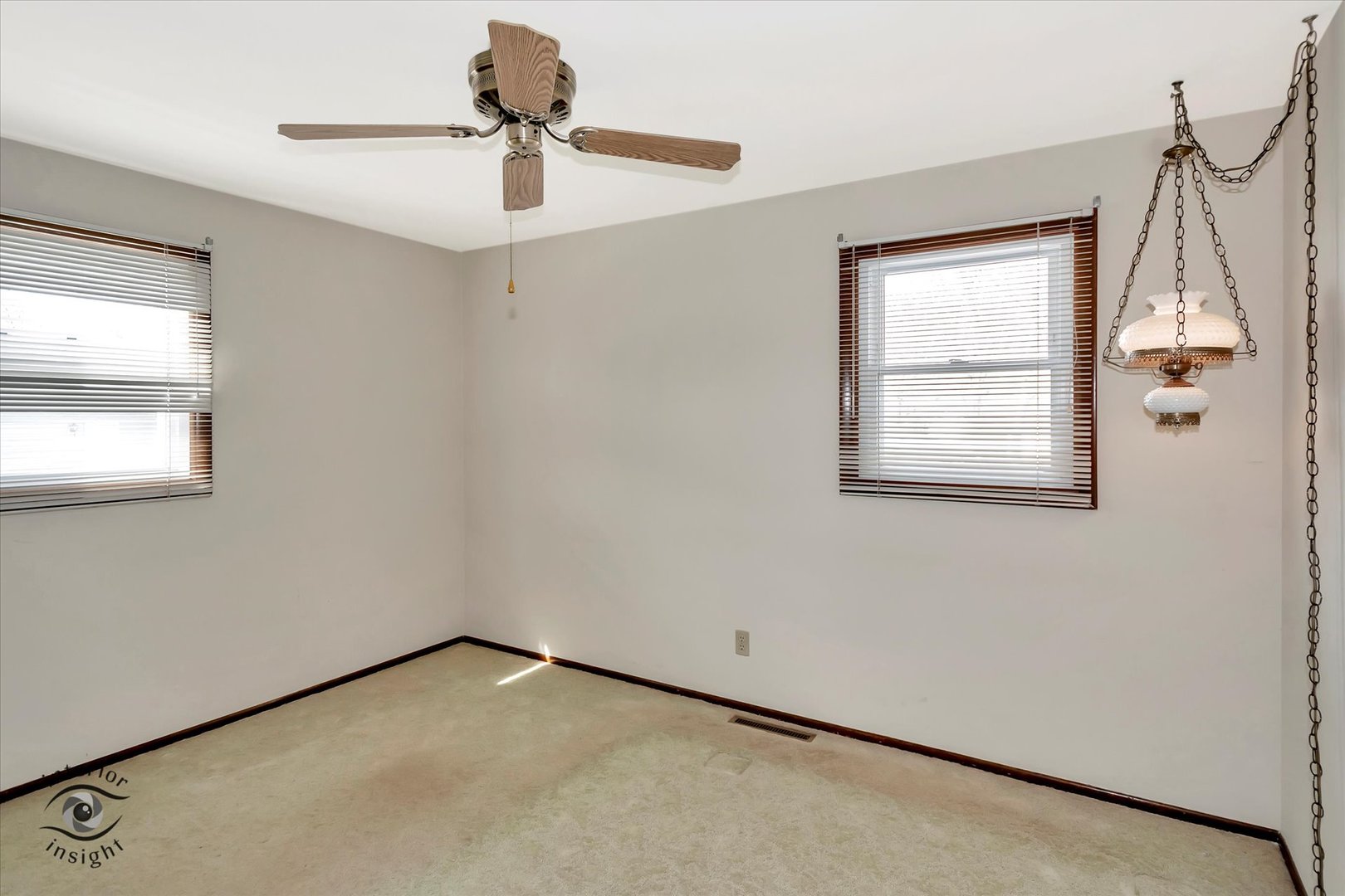 589 South Walnut Street Chebanse, IL 60922 - Photo 11 of 25 a view of empty room with windows