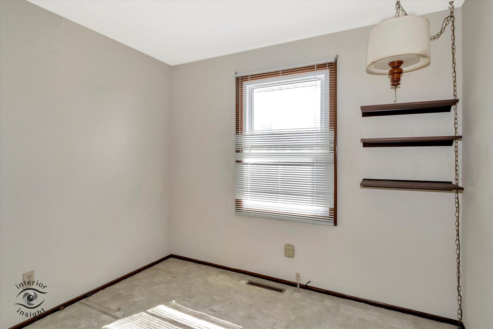 589 South Walnut Street Chebanse, IL 60922 - Photo 13 of 25 a view of an empty room with a window