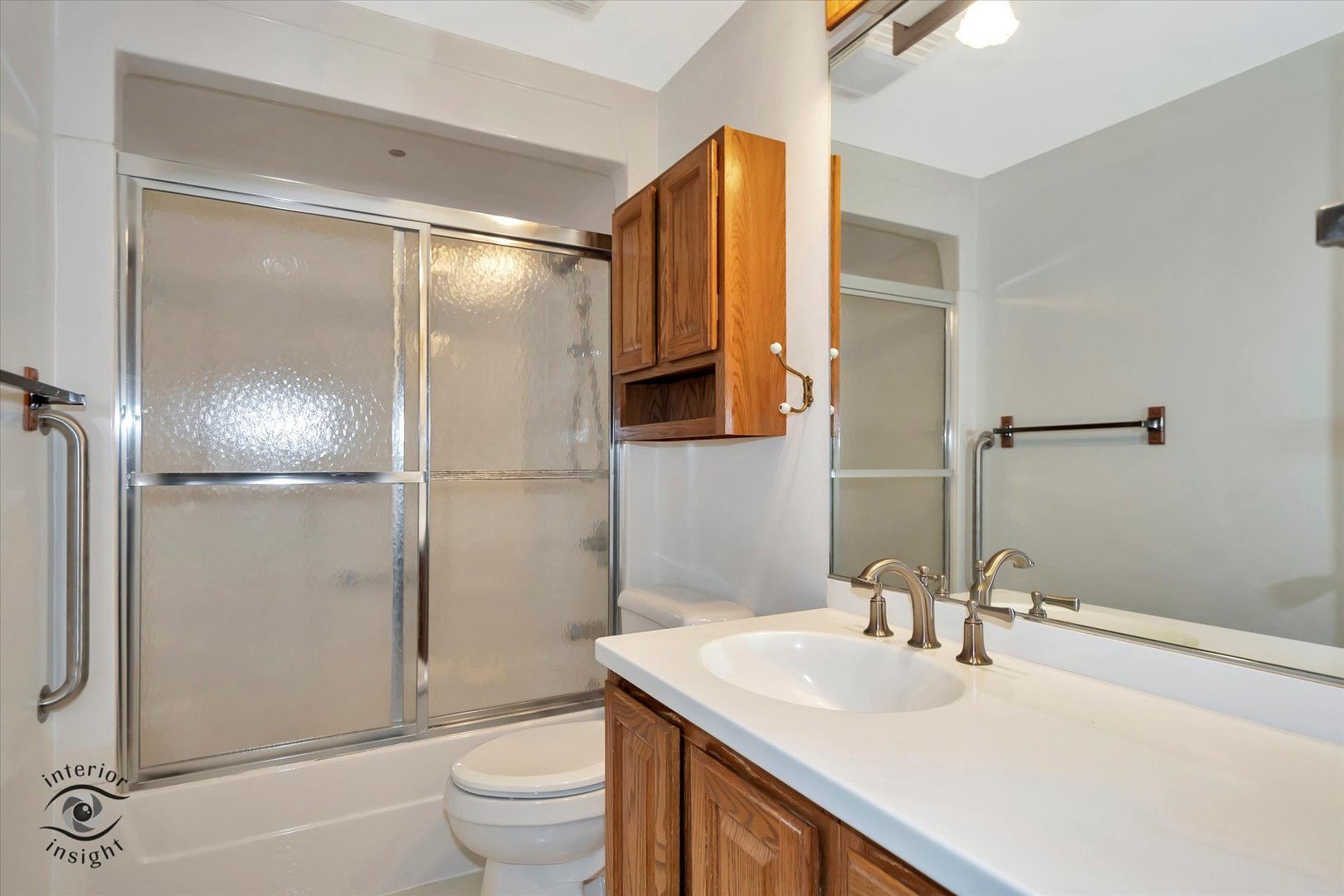 589 South Walnut Street Chebanse, IL 60922 - Photo 14 of 25 a bathroom with a sink toilet and shower