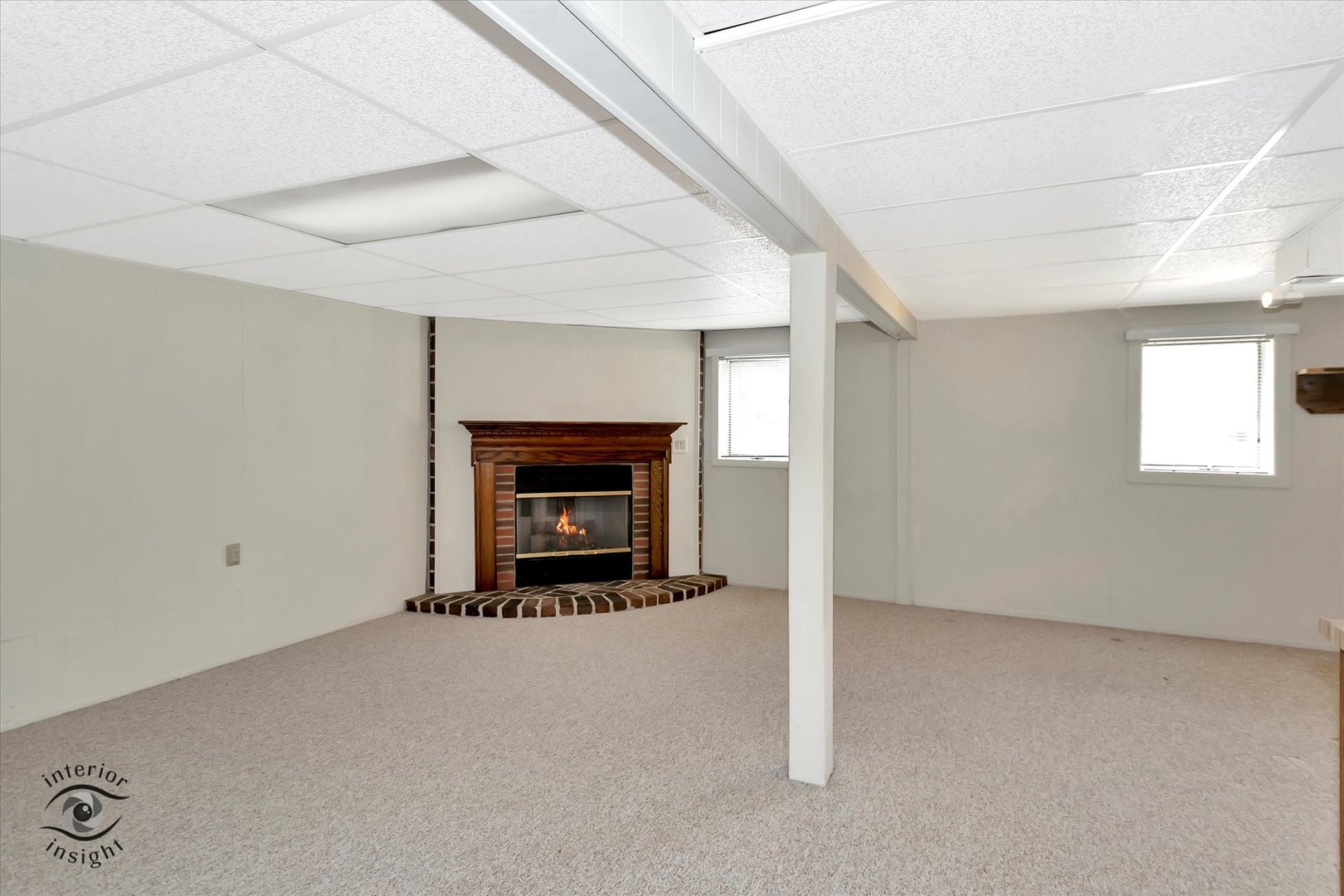 589 South Walnut Street Chebanse, IL 60922 - Photo 16 of 25 an empty room with a fireplace and window