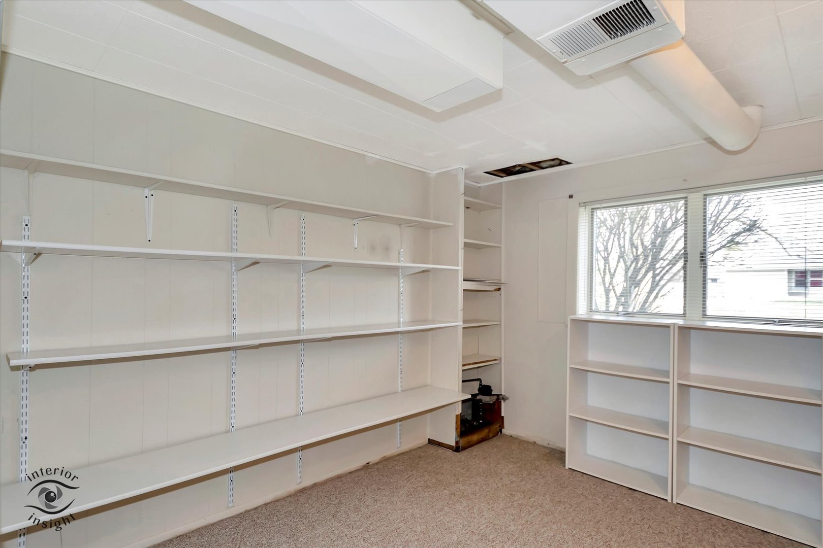 589 South Walnut Street Chebanse, IL 60922 - Photo 19 of 25 a room with walk in closet and window