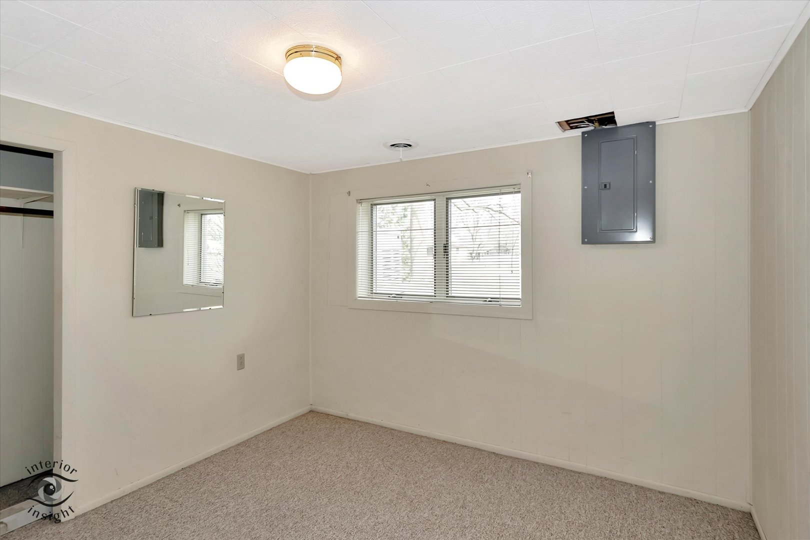589 South Walnut Street Chebanse, IL 60922 - Photo 20 of 25 a view of an empty room with a window
