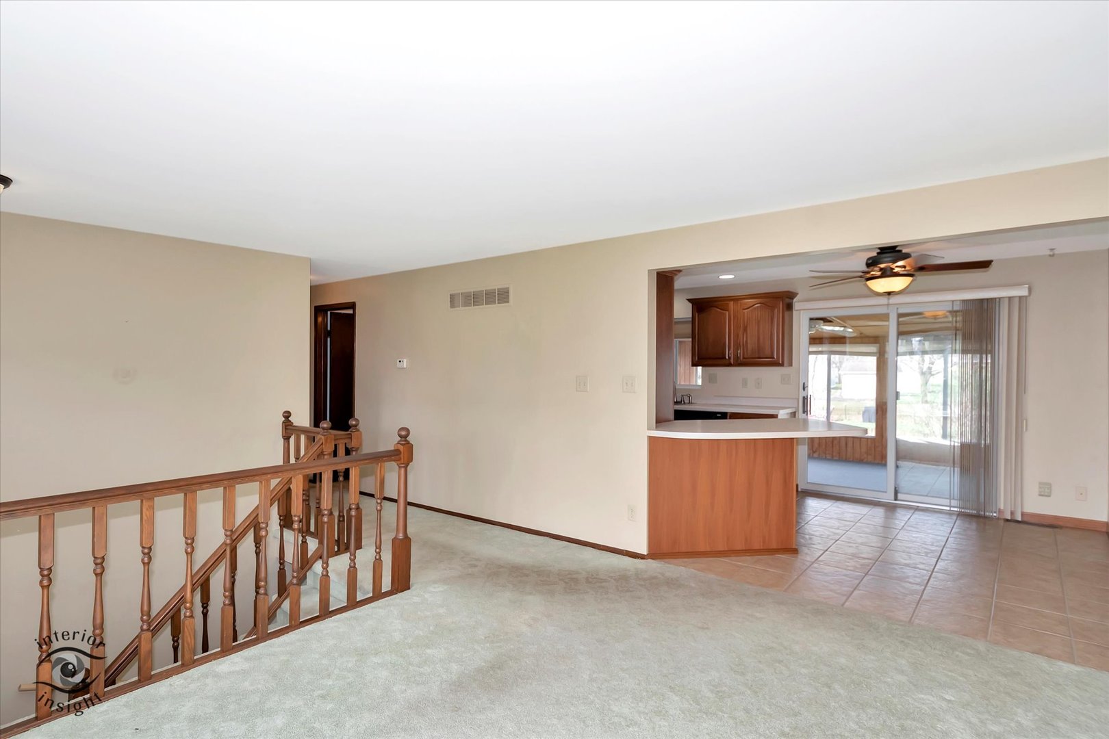 589 South Walnut Street Chebanse, IL 60922 - Photo 5 of 25 a view of a kitchen with a sink and a refrigerator