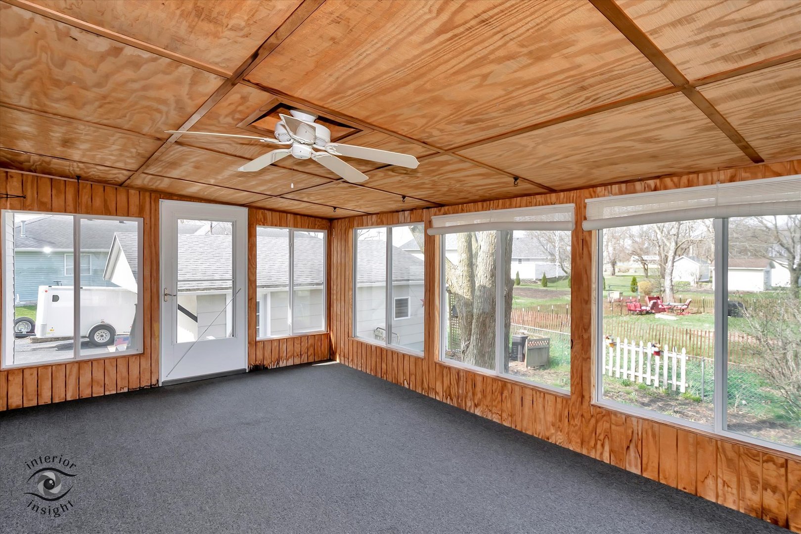 589 South Walnut Street Chebanse, IL 60922 - Photo 10 of 25 a big room with wooden walls and balcony
