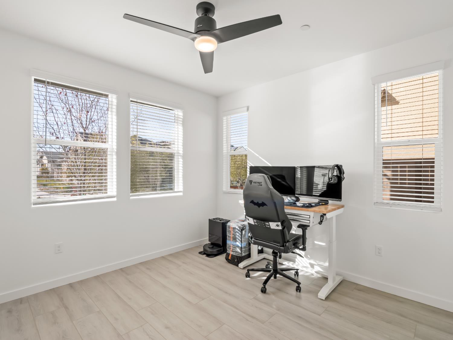 4071 Braden Road Madera, CA 93636 - Photo 11 of 31 a view of a workspace with furniture and a window