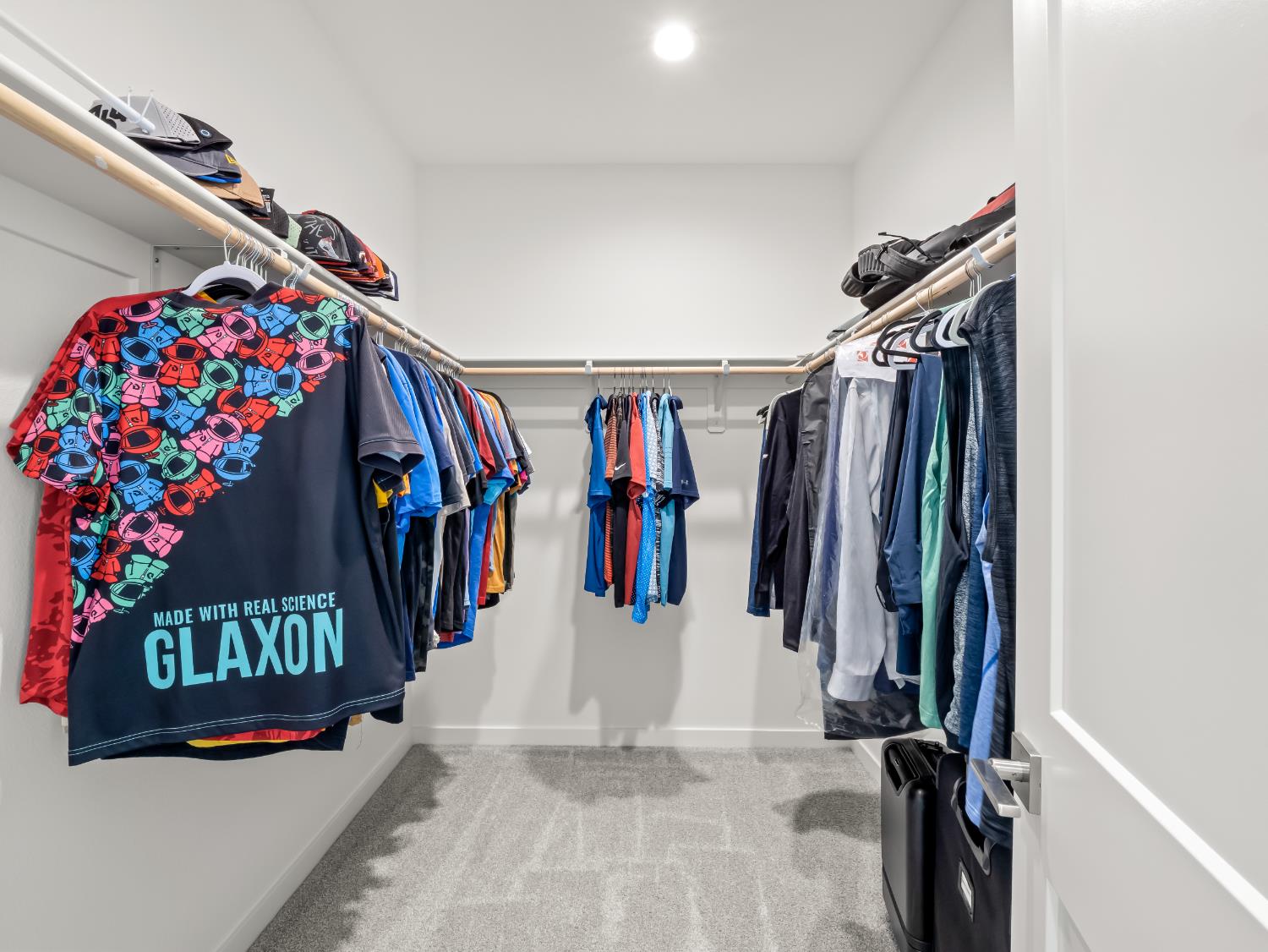 4071 Braden Road Madera, CA 93636 - Photo 20 of 31 a view of walk in closet with clothes and shoes