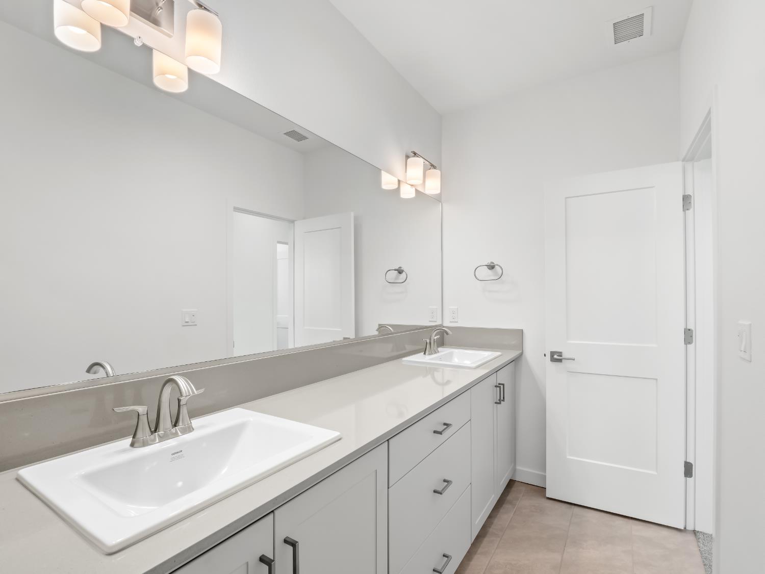 4071 Braden Road Madera, CA 93636 - Photo 25 of 31 a bathroom with a sink vanity granite and a mirror