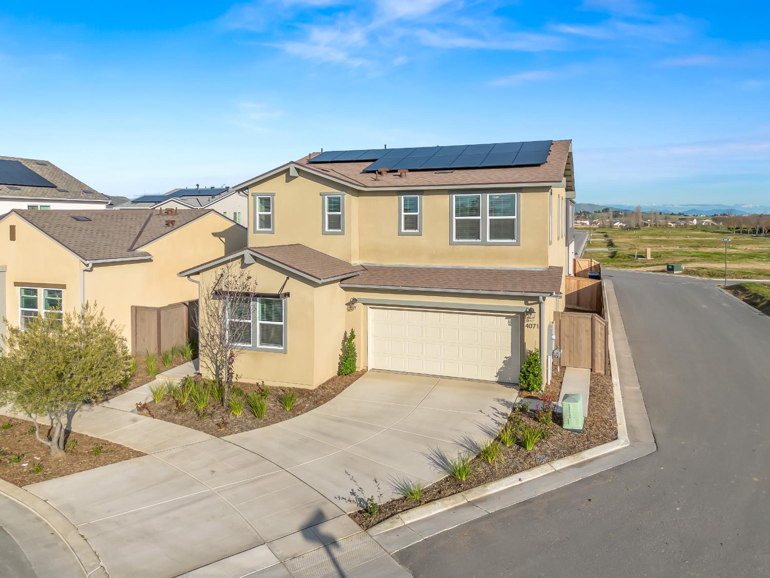 4071 Braden Road Madera, CA 93636 - Photo 3 of 31 a front view of a house with a yard
