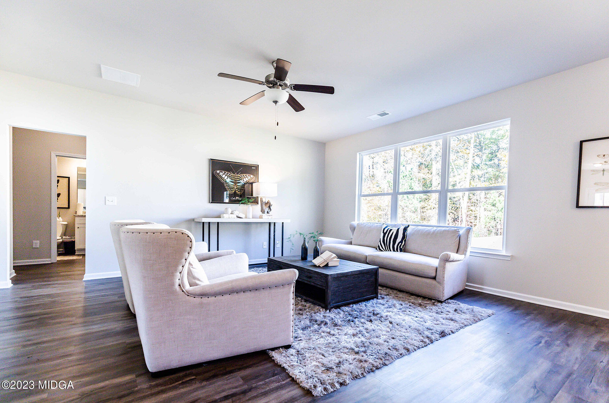 118 Red Birch Lane Warner Robins, GA 31093 - Photo 11 of 19 a living room with furniture and a window