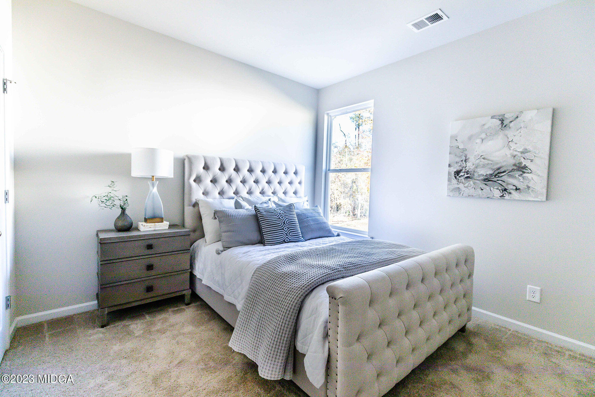 118 Red Birch Lane Warner Robins, GA 31093 - Photo 12 of 19 a bedroom with a bed and a window