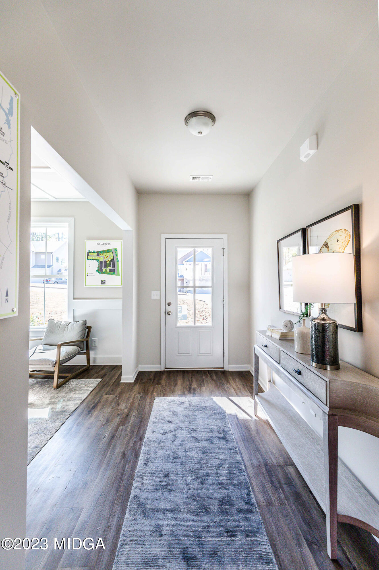118 Red Birch Lane Warner Robins, GA 31093 - Photo 5 of 19 a living room with furniture and a large window