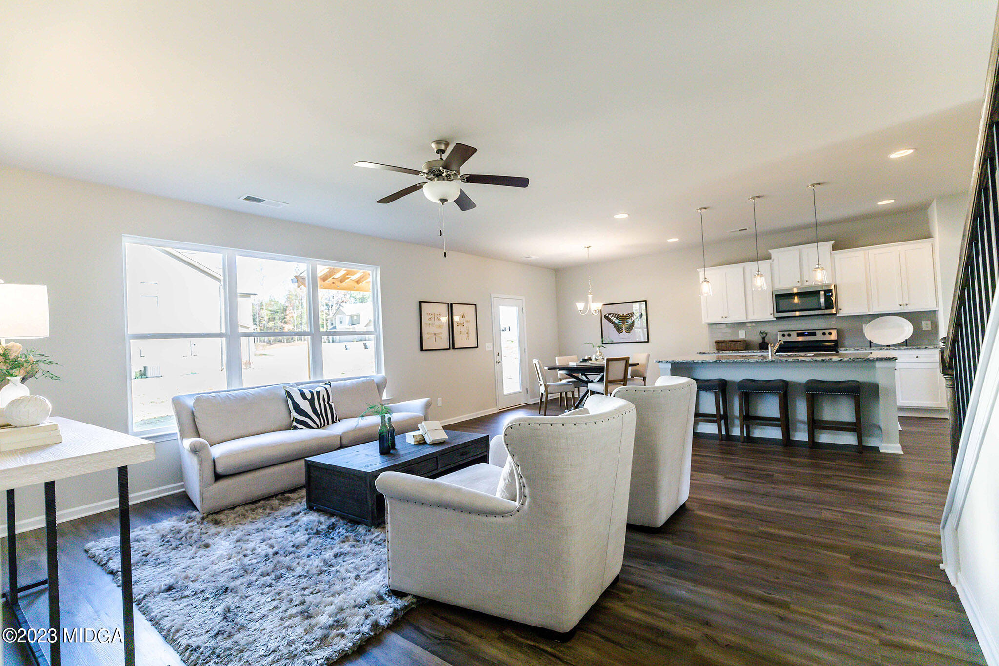 118 Red Birch Lane Warner Robins, GA 31093 - Photo 10 of 19 a living room with furniture and a wooden floor
