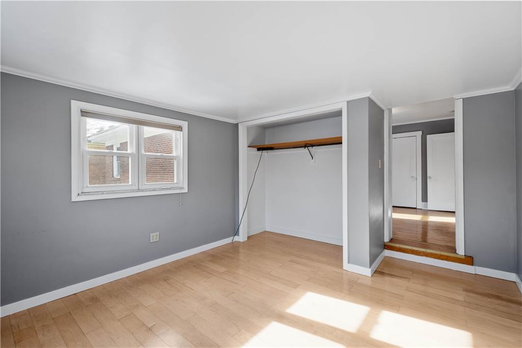 86 Duncan Avenue Pittsburgh, PA 15205 - Photo 14 of 30 a view of empty room with wooden floor and fan