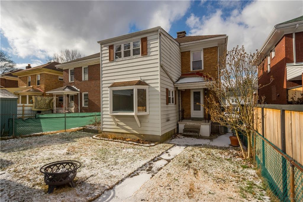86 Duncan Avenue Pittsburgh, PA 15205 - Photo 29 of 30 a front view of a house with a yard