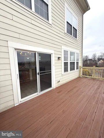 a view of balcony with furniture