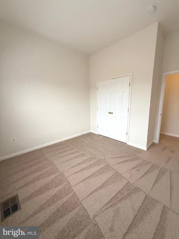 a view of hallway with livingroom