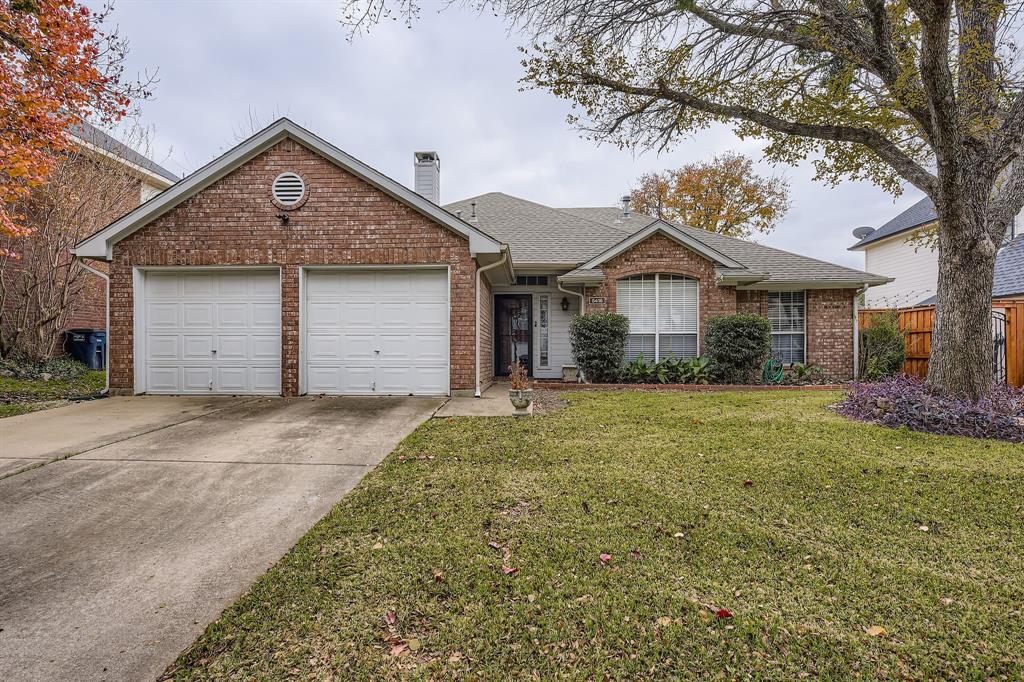 5416 Catlow Valley Road Fort Worth, TX 76137 - Photo 1 of 28 a front view of a house with a yard and garage