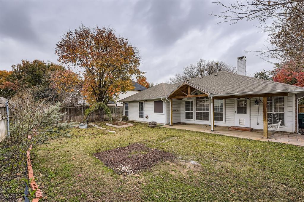 5416 Catlow Valley Road Fort Worth, TX 76137 - Photo 27 of 28 a view of a house with a yard