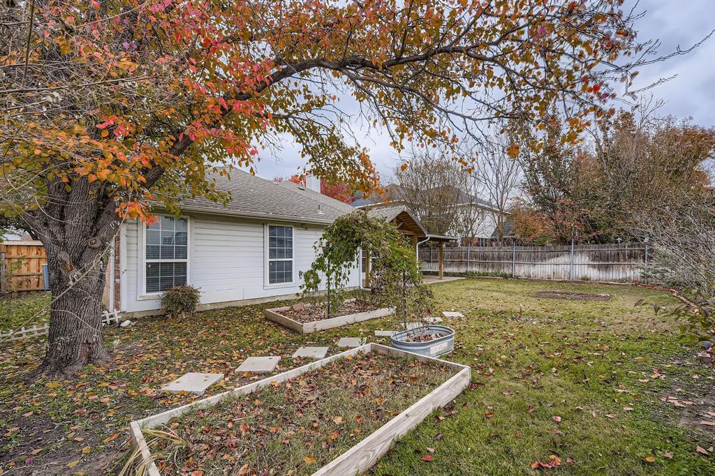 5416 Catlow Valley Road Fort Worth, TX 76137 - Photo 28 of 28 a view of a house with pool yard and trees