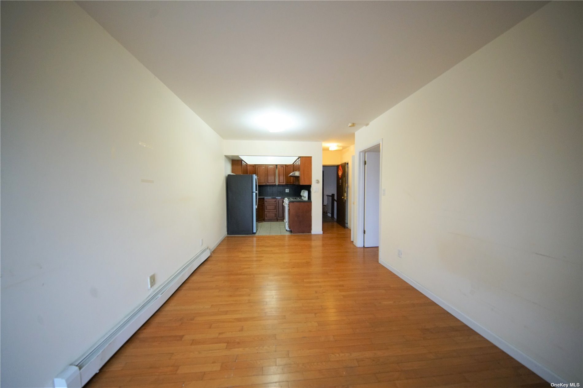 132-56 60th Avenue Queens, NY 11355 - Photo 5 of 8 a view of hallway with a white walls