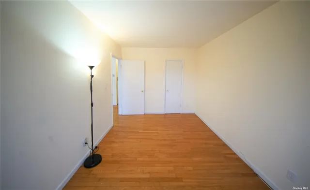 a view of hallway with a large window