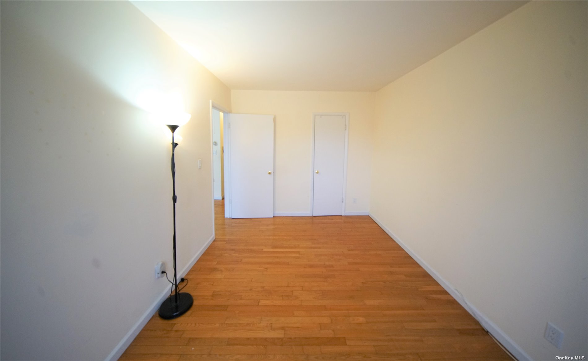 132-56 60th Avenue Queens, NY 11355 - Photo 6 of 8 a view of hallway with a large window