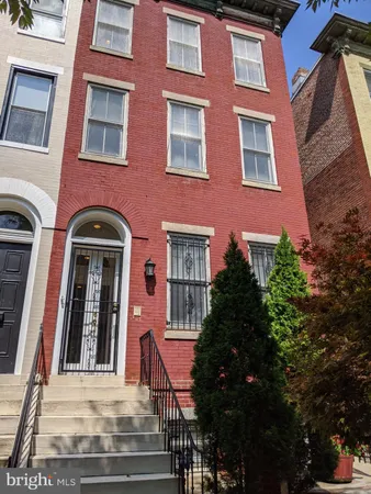 a front view of a multi story residential apartment building