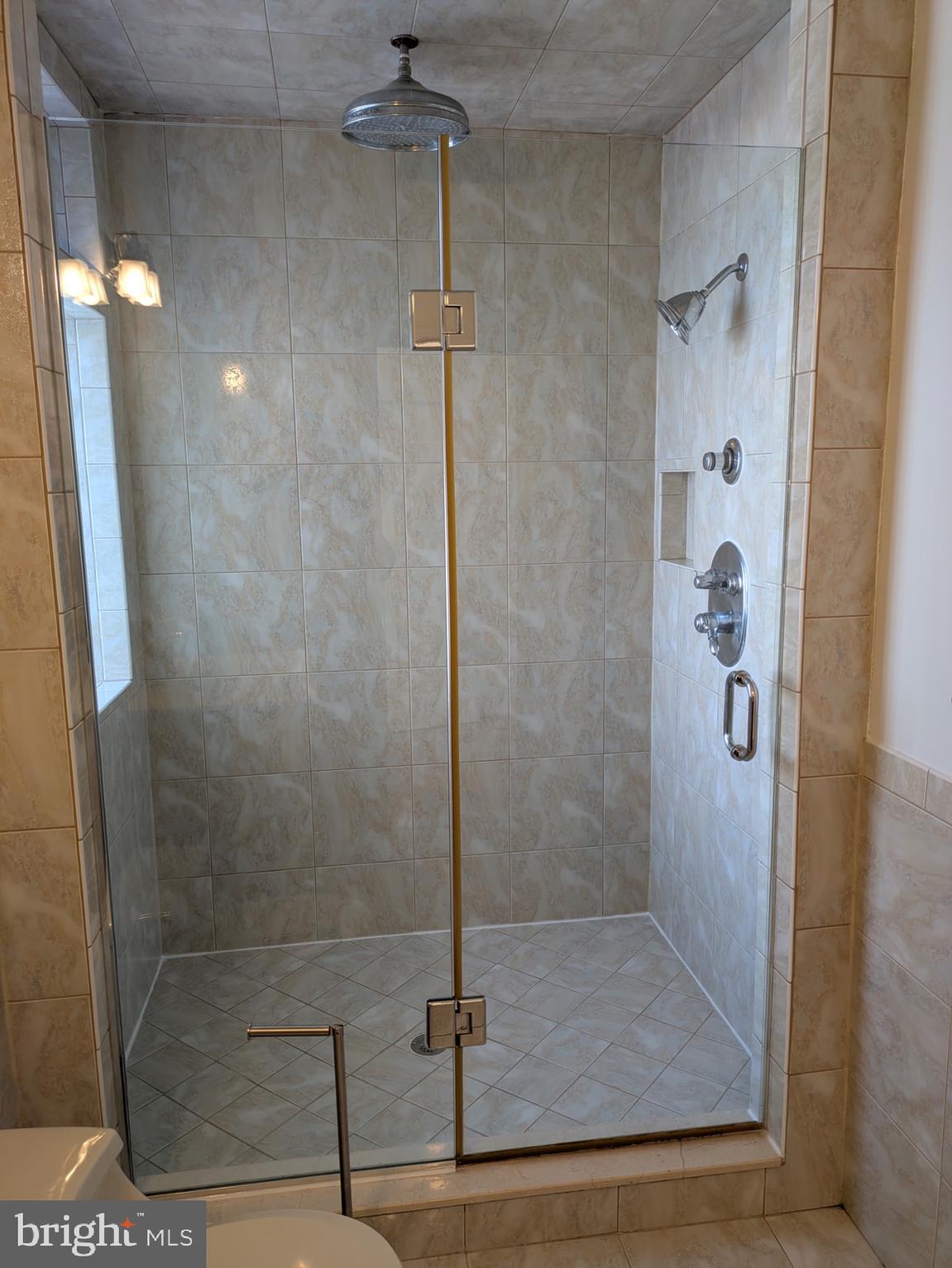 1421 Q Street Northwest, Unit 1 Washington, DC 20009 - Photo 18 of 19 a bathroom with a shower