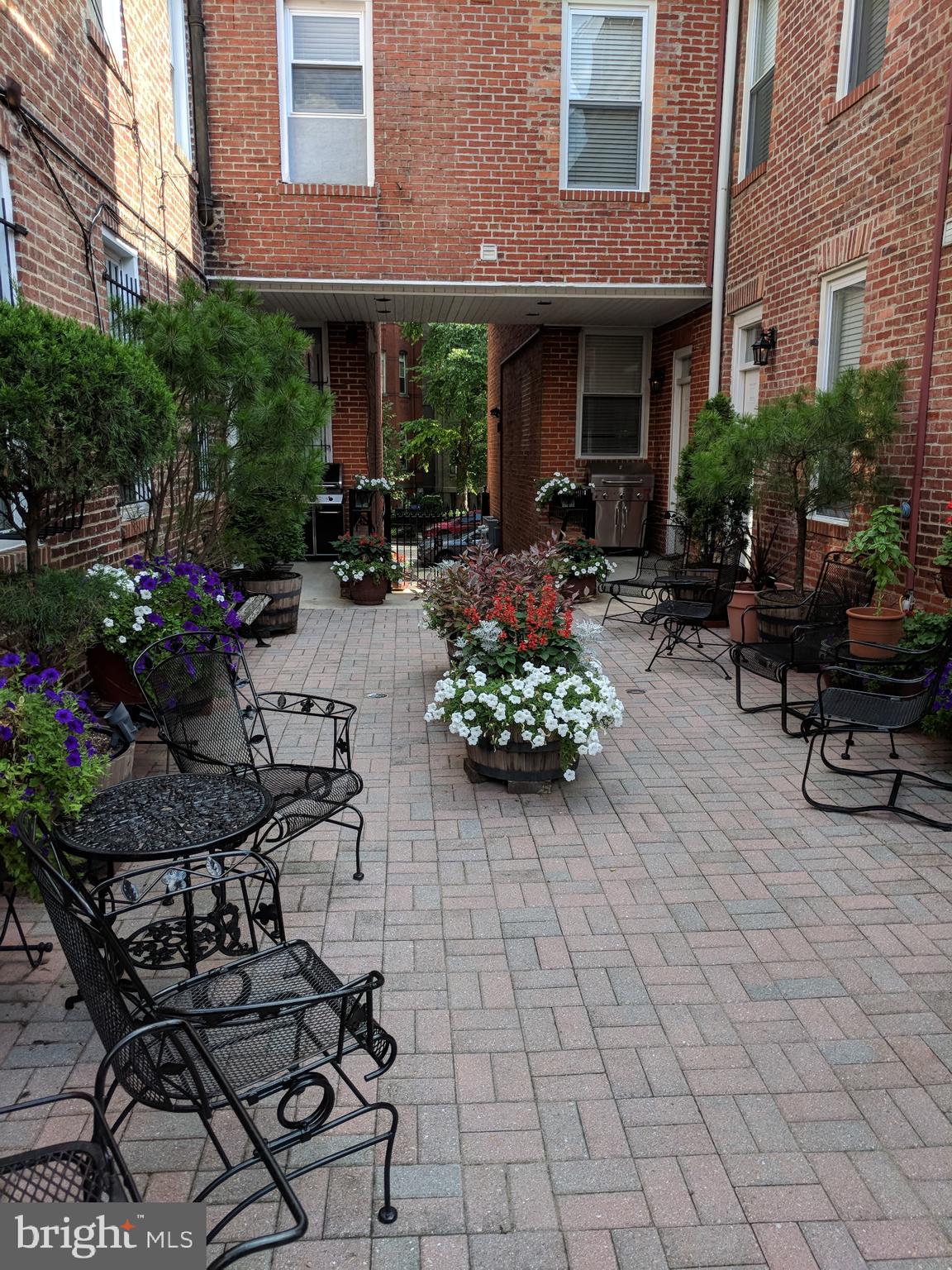 1421 Q Street Northwest, Unit 1 Washington, DC 20009 - Photo 2 of 19 a view of a building with sitting area