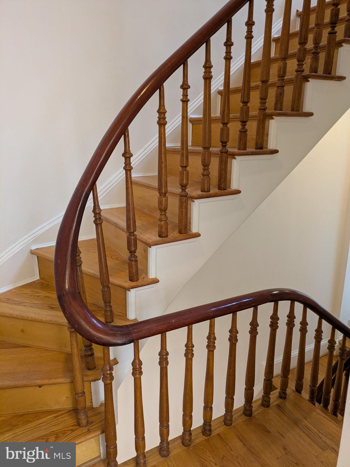 1421 Q Street Northwest, Unit 1 Washington, DC 20009 - Photo 8 of 19 a view of staircase with a metal railing and a large window